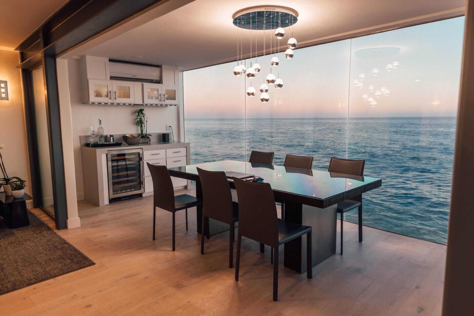 What happens to a home elevator when the power goes out? 26 house-windows-sea-dinner